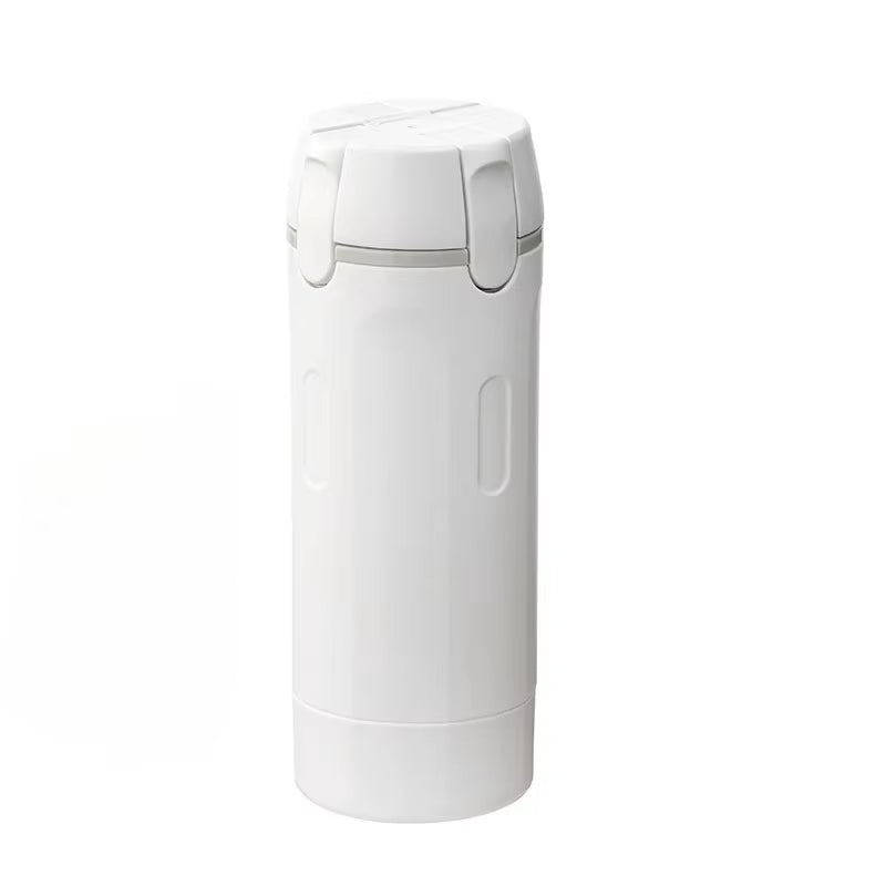 Lathrio 4-in-1 travel dispenser in white, closed, with four labelled bottles inside